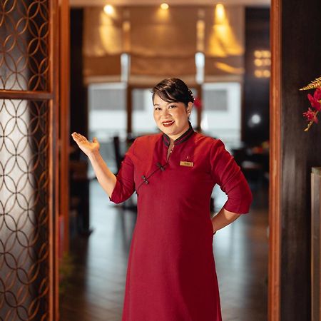 מלון Sofitel Cairo Downtown Nile מראה חיצוני תמונה A hotel hostess in Vietnam